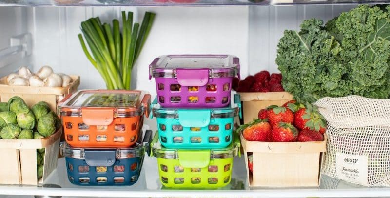 Fridge shelf with fresh produce and containers