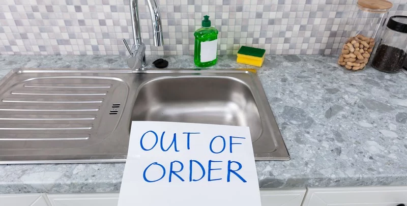 out of order text stuck on kitchen sink