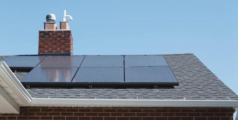 Solar panels for a solar hot water system on a house roof.